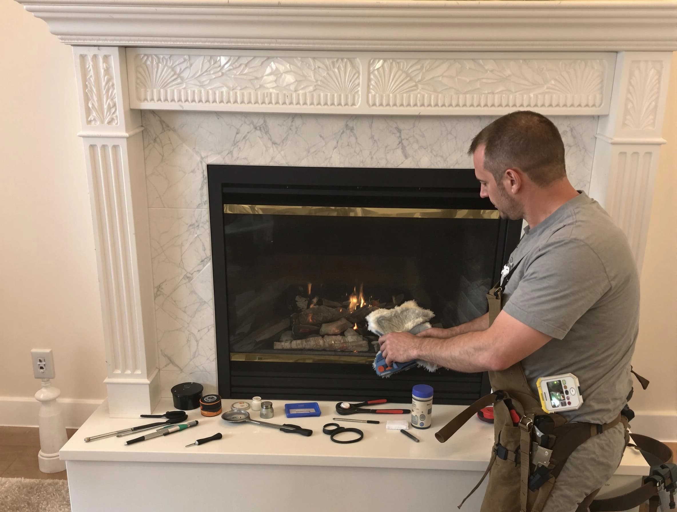 Denver Chimney Sweep performing fireplace maintenance in Denver, CO